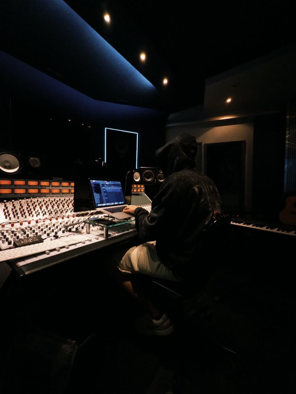 René da Silva working privately at the console during a ghost production session.